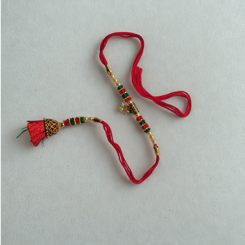 Red Tassel Designer Lumba Rakhi for Bhabhi