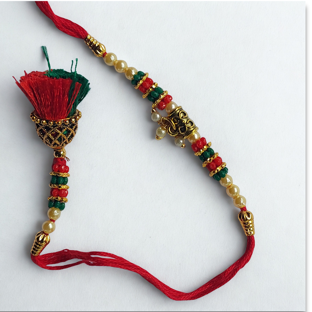 Red Tassel Designer Lumba Rakhi for Bhabhi