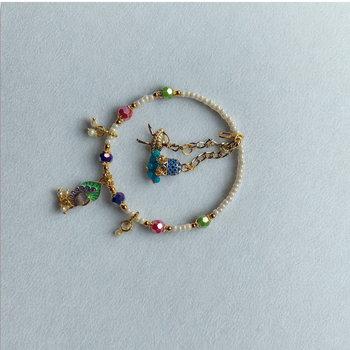 Multicolor Pearl Lumba Rakhi Set with Decorative Charms