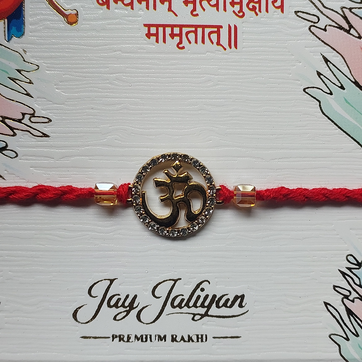 Traditional Red Bhai Rakhi with Gold-Tone Charm